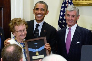 President Barack Obama awards the Medal of Honor to 1st Lt. Alonzo H. Cushing for his gallantry during combat at Gettysburg July 3, 1863. Receiving the medal at the White House ceremony, Nov. 6, 2014, is Helen Loring Ensign, Cushing's first cousin, twice removed. Some 24 other descendants were present as well. To the president's immediate right is Secretary of the Army John M. McHugh. Photo Credit: Staff Sgt. Laura Buchta