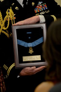 A Soldier displays the Medal of Honor for 1st Lt. Alonzo H. Cushing, awarded during a White House ceremony, Nov. 6, 2014, to recognize Cushing's heroism at the Battle of Gettysburg. Photo Credit: Staff Sgt. Laura Buchta