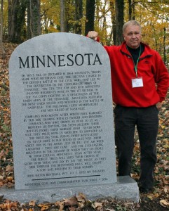 Minnesota State Representative and co-chairman of the Minnesota Civil War Task Force, Dean Urdahl, next to the new Minnesota monument on Shy's Hill, Nashville, Tenn.