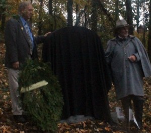 Minnesota State Representative Dean Urdahl and Battle of Nashville Preservation Society representative James D. Kay Jr. unveil the new monument to Minnesotans who fought in the Battle of Nashville during the Nov. 16 ceremony.