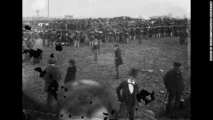 This Nov. 19, 1863 photo made available by the Library of Congress shows the crowd assembled for President Abraham Lincoln's address at the dedication of a portion of the battlefield at Gettysburg, Pa. as a national cemetery. "The battlefield, on that sombre autumn day, was enveloped in gloom," Joseph Ignatius Gilbert, a freelancer for The Associated Press at the time, wrote in a paper delivered at the 1917 convention of the National Shorthand Reporters' Association in Cleveland. "Nature seemed to veil her face in sorrow for the awful tragedy enacted there." (AP Photo/Library of Congress, Alexander Gardner)